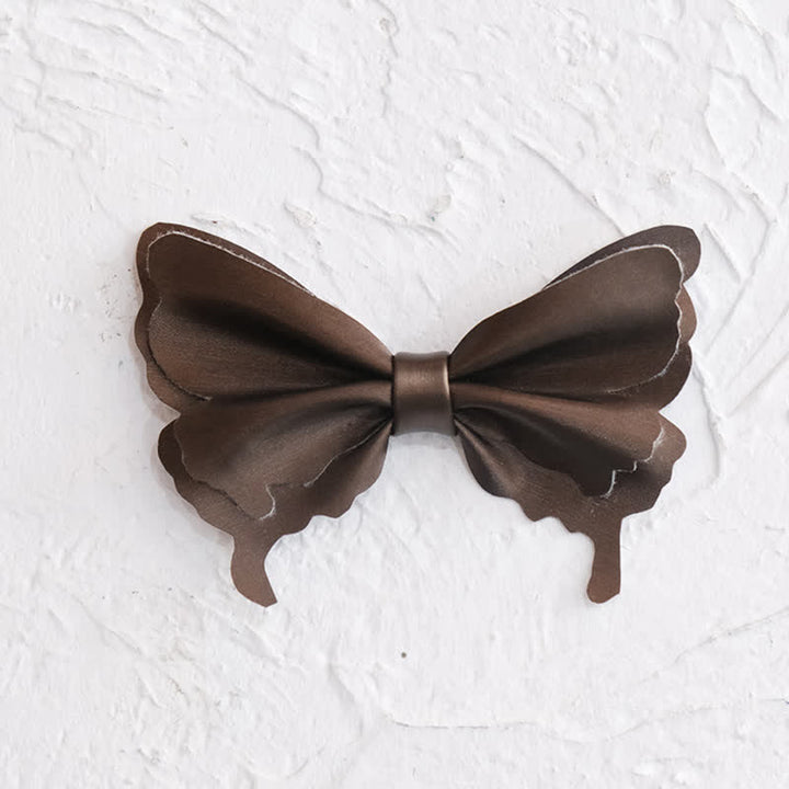 Papillon da uomo in pelle conciata al vegetale a forma di farfalla