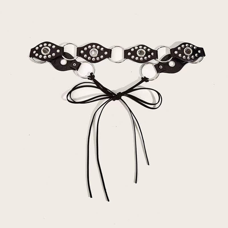 Cintura da donna in pelle con rivetti circolari e anello in vita con corda