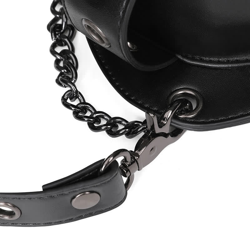 Borsa a spalla convertibile con design a teschio e gamba