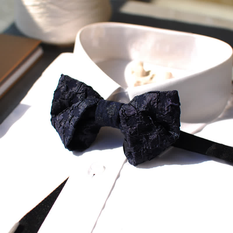 Papillon elegante da uomo in jacquard nero floreale