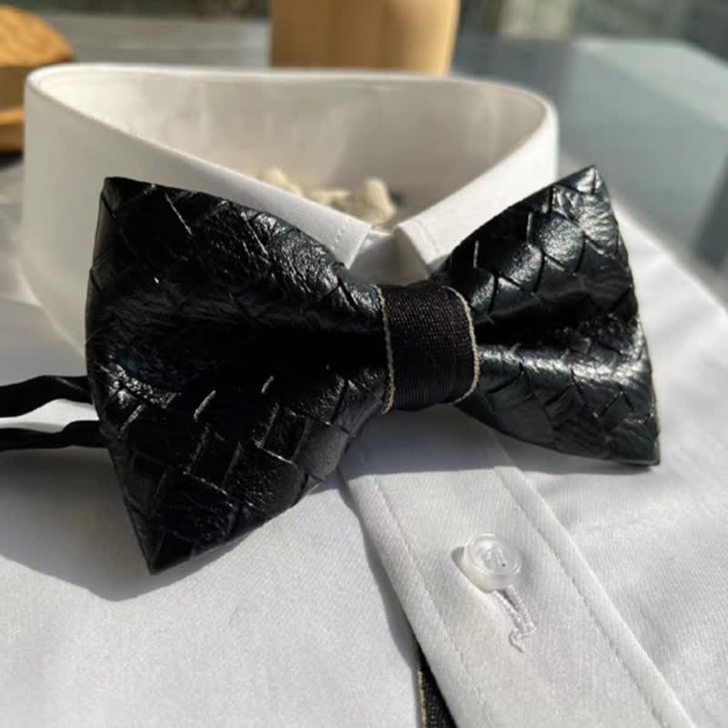 Papillon in pelle nera con motivo intrecciato da uomo