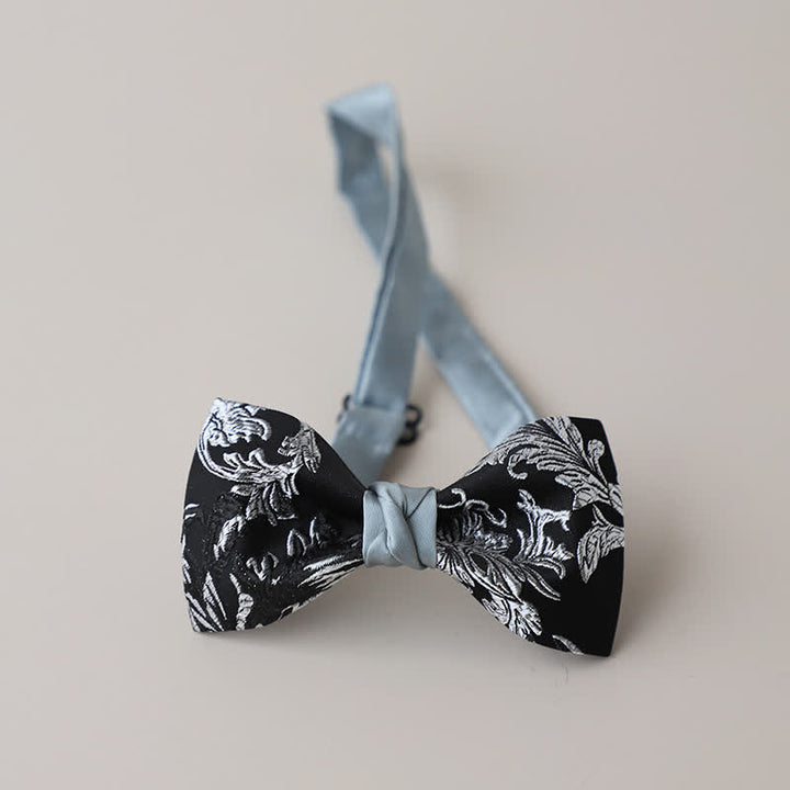 Papillon da uomo con ricamo floreale bianco e nero
