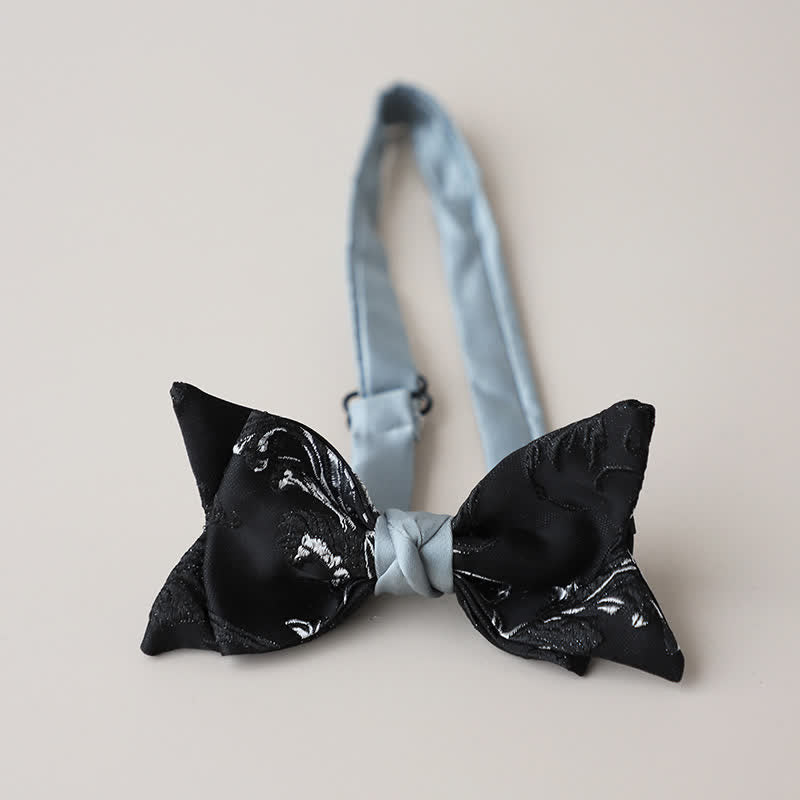 Papillon da uomo con ricamo floreale bianco e nero