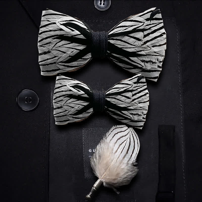 Papillon con piume a strisce zebrate bianche e nere per bambini con spilla da bavero