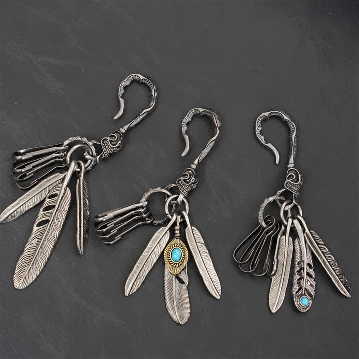 Portachiavi in pelle turchese blu con piume di teschio boho