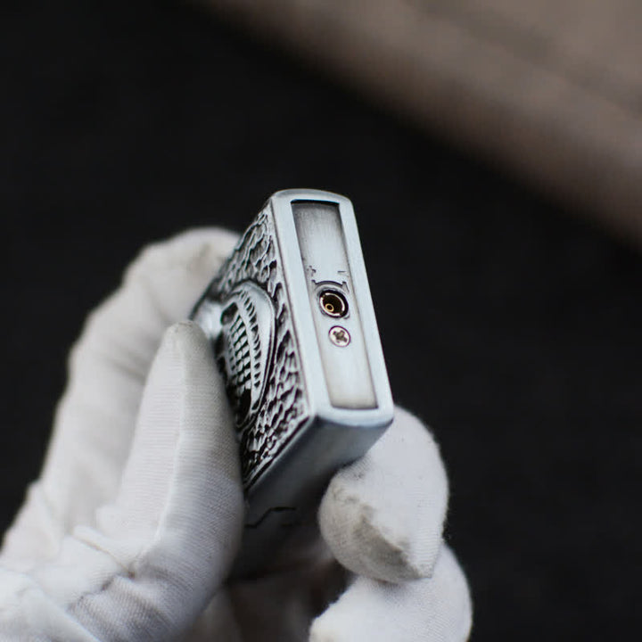 Accendino a butano ricaricabile con design a forma di grande teschio