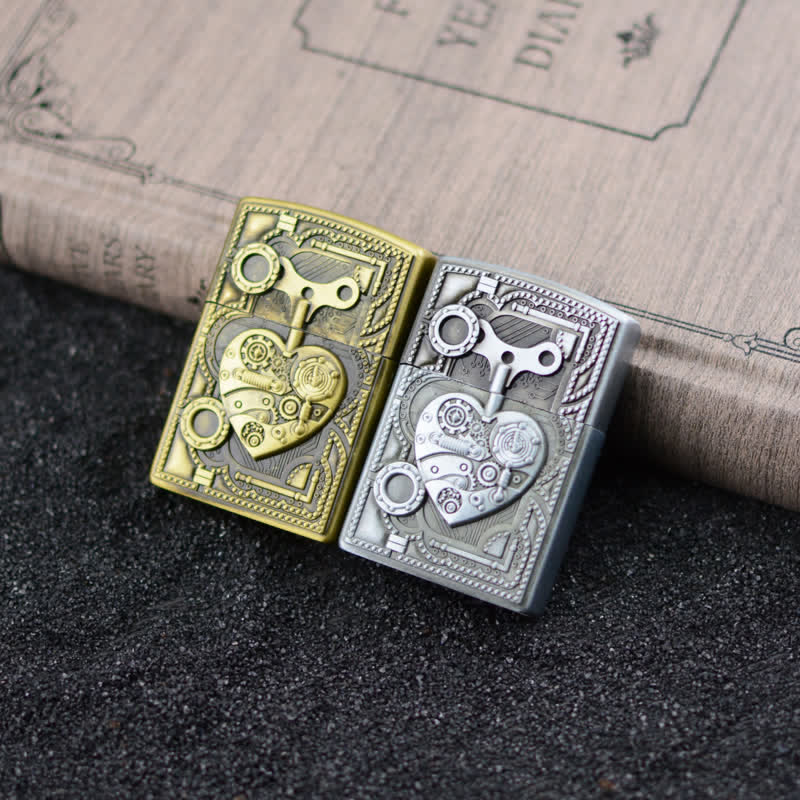 Accendino a butano ricaricabile con design a cuore in rilievo meccanico