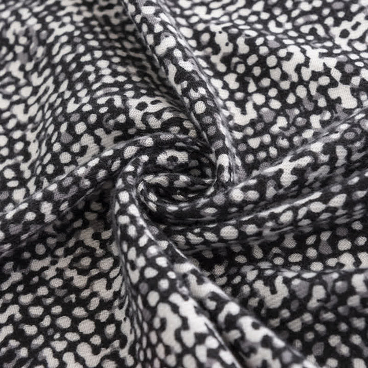 Sciarpa da donna con motivo a pelle di serpente nera e linea rossa