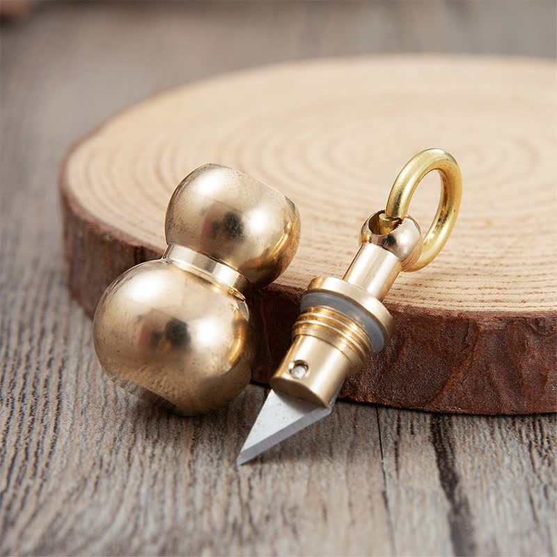 Portachiavi con coltello nascosto EDC in ottone a forma di zucca