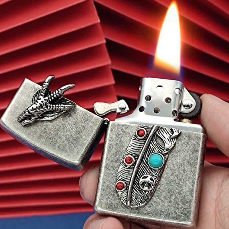 Accendino a cherosene ricaricabile in finto turchese con piuma d'aquila