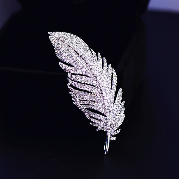 Spilla da donna minimalista in argento con zirconi e piume
