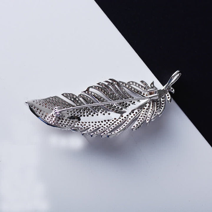 Spilla da donna minimalista in argento con zirconi e piume