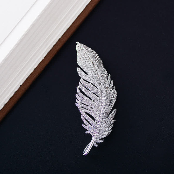 Spilla da donna minimalista in argento con zirconi e piume