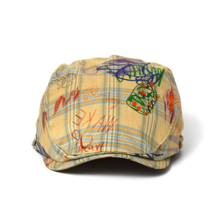 Cappello basco a quadri con motivo graffiti unico ed elegante