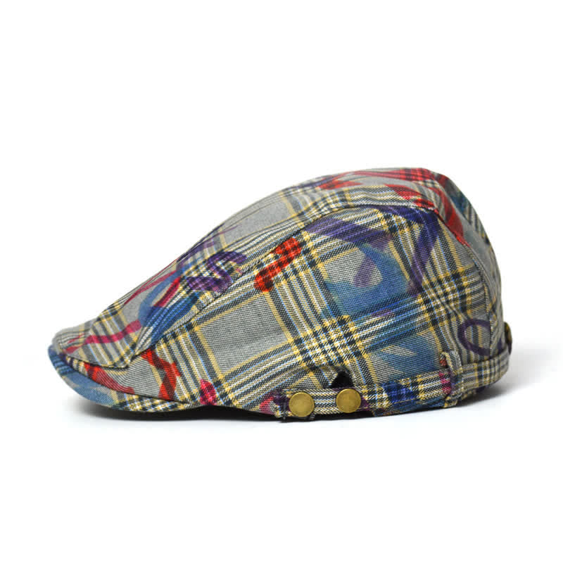 Cappello basco a quadri con motivo graffiti unico ed elegante