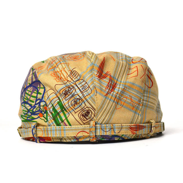 Cappello basco a quadri con motivo graffiti unico ed elegante
