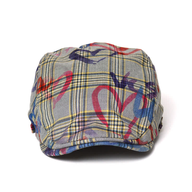 Cappello basco a quadri con motivo graffiti unico ed elegante
