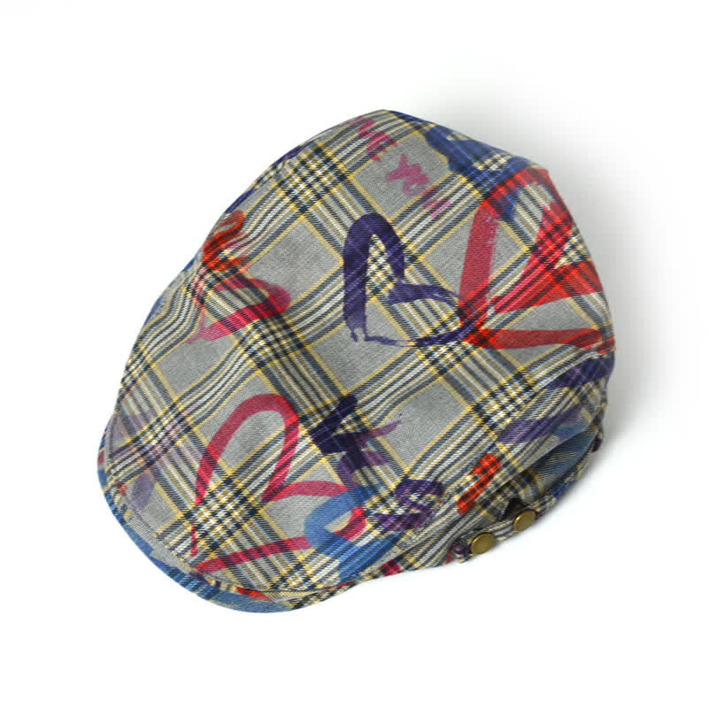 Cappello basco a quadri con motivo graffiti unico ed elegante