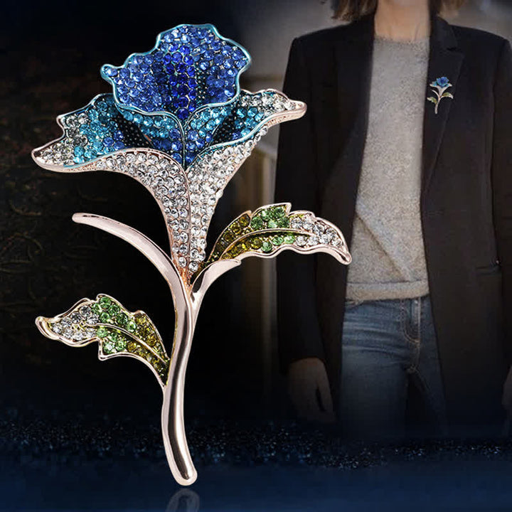 Graziosa spilla con fiore di orchidea e strass