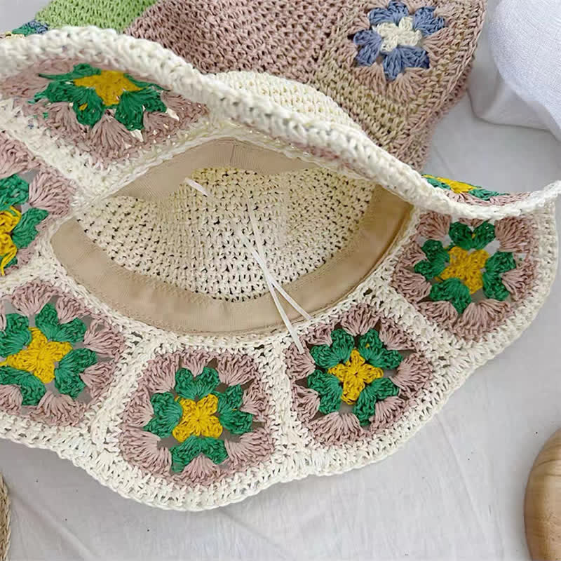 Cappello da donna in paglia pieghevole intrecciato all'uncinetto floreale