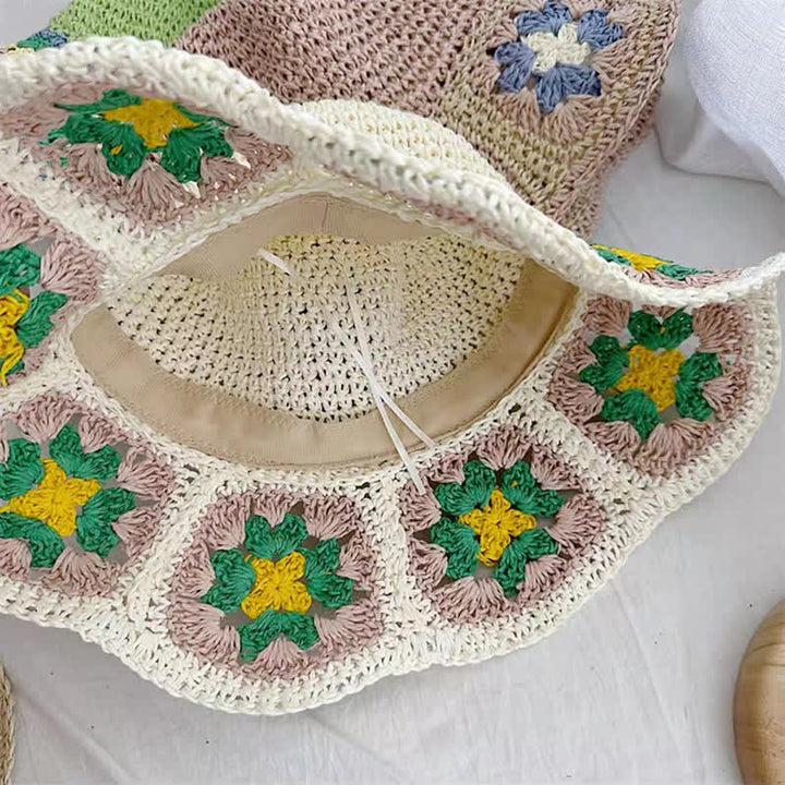 Cappello da donna in paglia pieghevole intrecciato all'uncinetto floreale