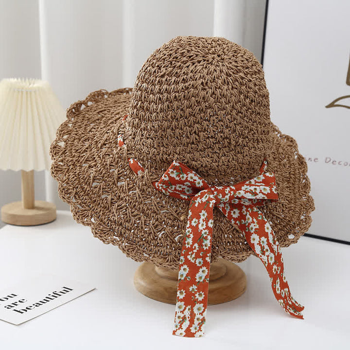 Cappello di paglia pieghevole con decorazione floreale a nastro da donna