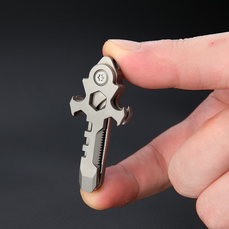 Portachiavi con mini coltello pieghevole multifunzionale in titanio Cross
