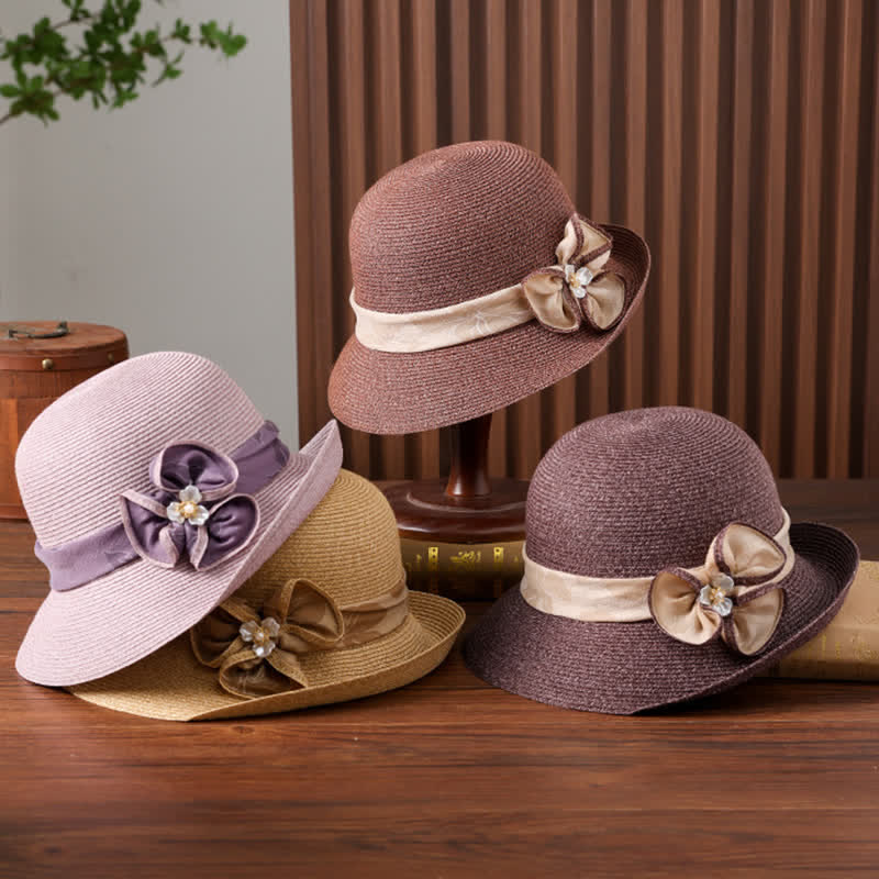 Cappello da donna in paglia con decorazione a margherita e nastro floreale