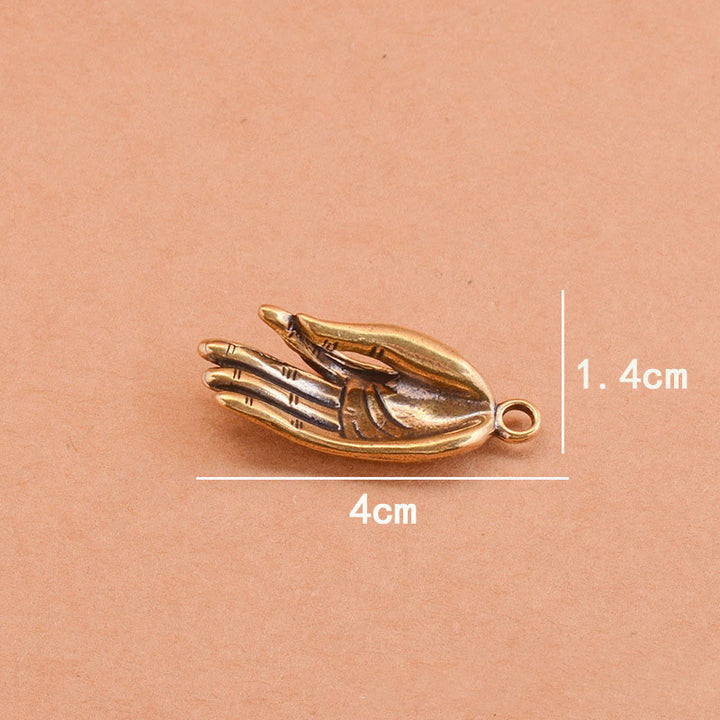 Coltello pieghevole in ottone colorato con mano di Buddha e collana in pietra rossa - image 8