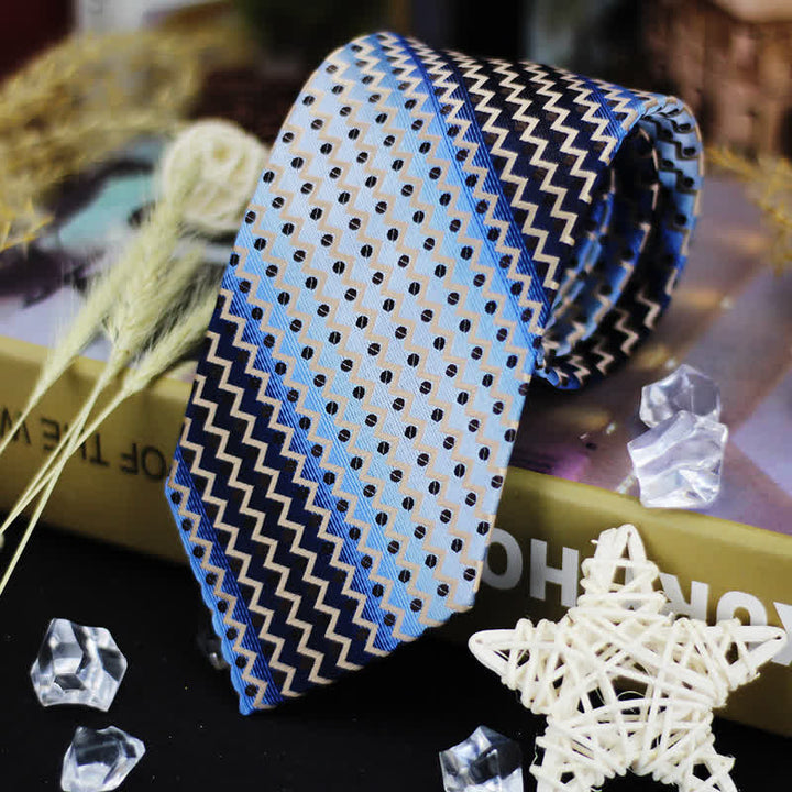 Cravatta a righe a zig-zag con pois blu e neri sfumati da uomo