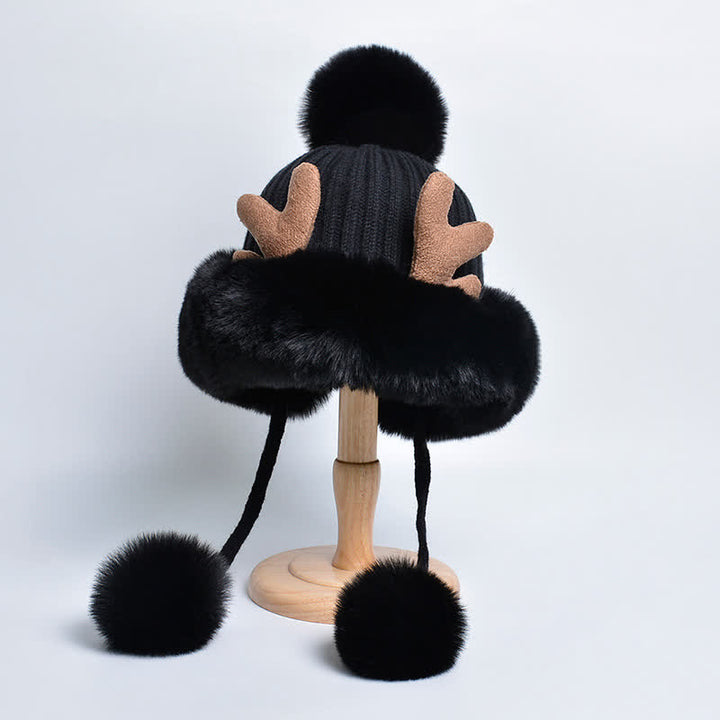 Cappello lavorato a maglia con pompon in corno di cervo da donna