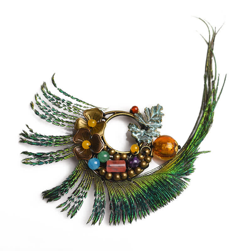 Spilla da donna retrò in bronzo con fiore e piuma di pavone