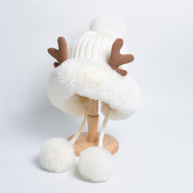 Cappello lavorato a maglia con pompon in corno di cervo da donna