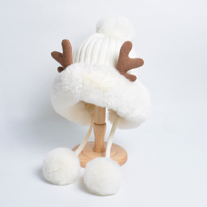 Cappello lavorato a maglia con pompon in corno di cervo da donna