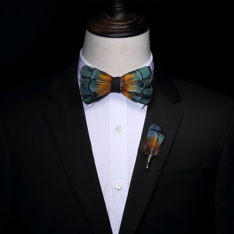 Papillon con piume di girasole verde e arancione con spilla da bavero