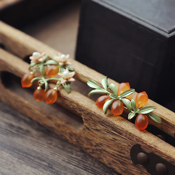 Spilla pastorale da donna con frutti di bosco arancioni