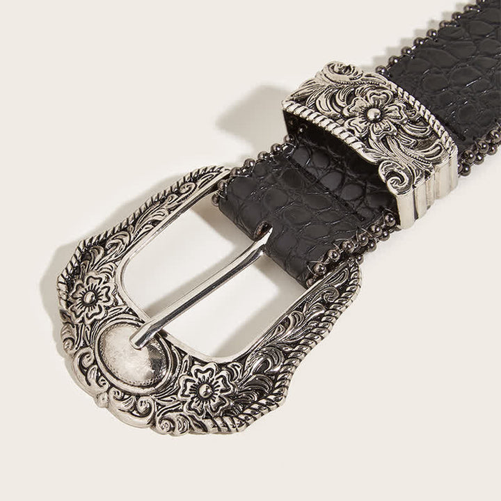 Cintura in pelle con stampa coccodrillo e bordo macramè da donna