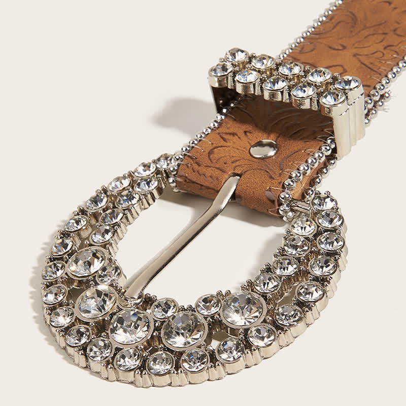 Cintura in pelle con fibbia rotonda in strass da donna e bordo perlinato