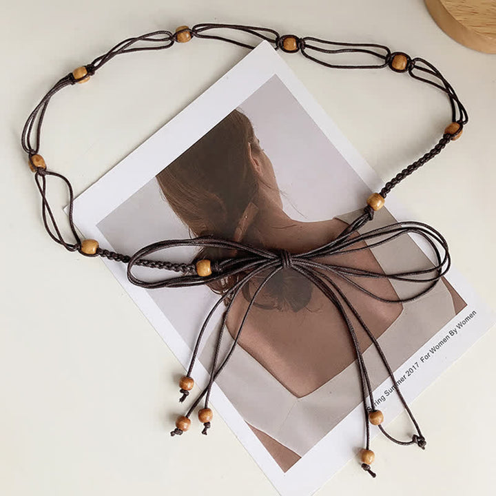 Cintura intrecciata in corda con decorazione di perline in stile Boemia da donna