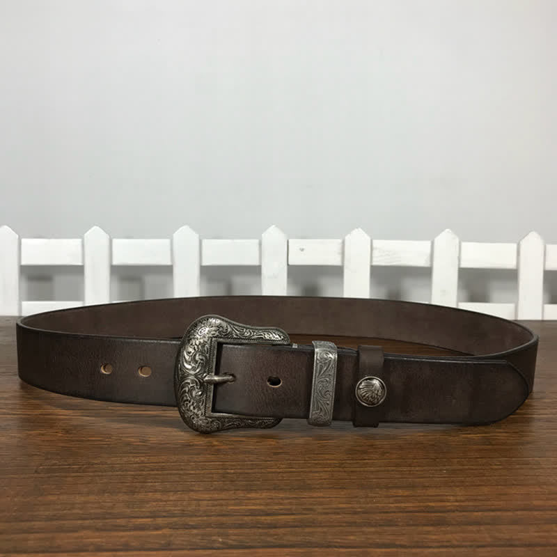 Cintura in pelle con elemento floreale indiano inciso