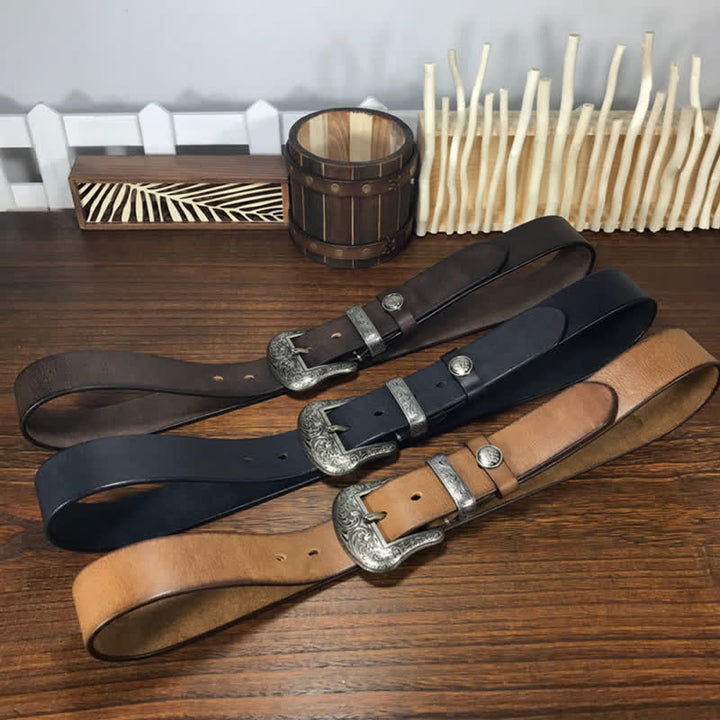 Cintura in pelle con elemento floreale indiano inciso