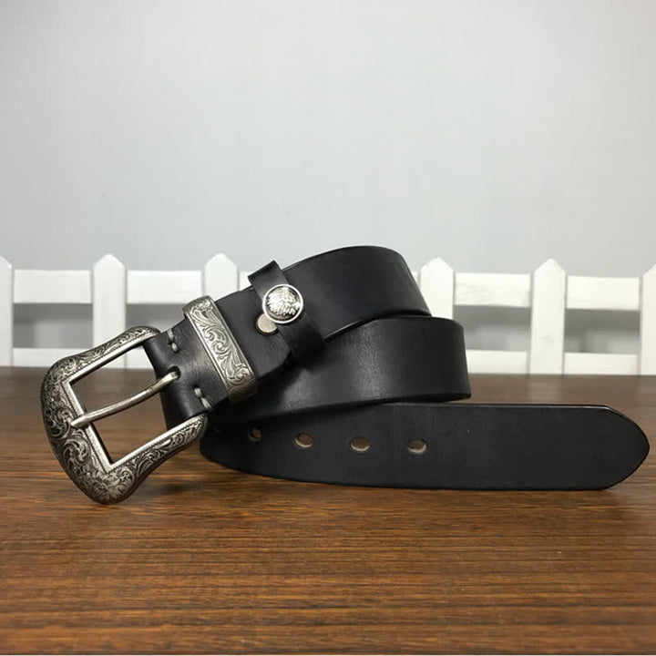 Cintura in pelle con elemento floreale indiano inciso