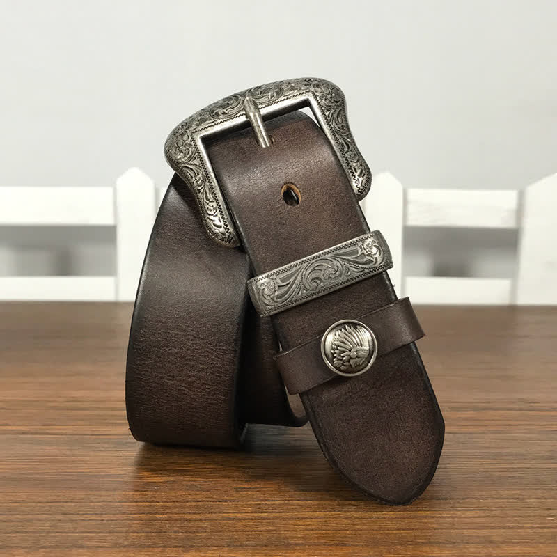 Cintura in pelle con elemento floreale indiano inciso