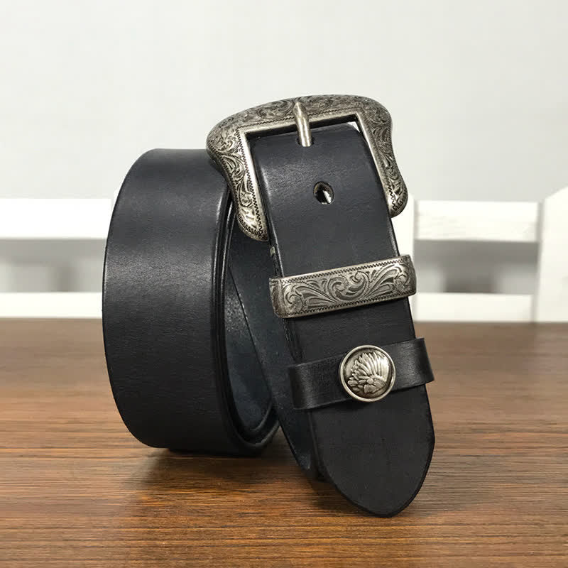 Cintura in pelle con elemento floreale indiano inciso
