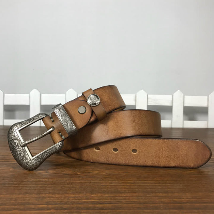 Cintura in pelle con elemento floreale indiano inciso
