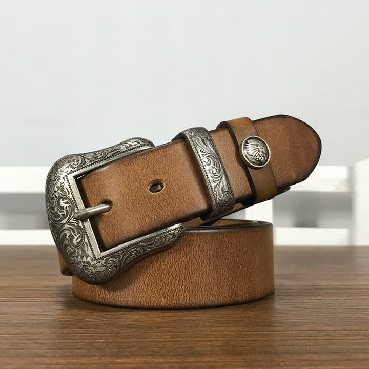 Cintura in pelle con elemento floreale indiano inciso