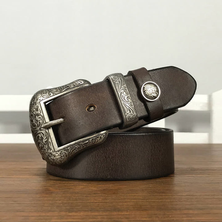 Cintura in pelle con elemento floreale indiano inciso