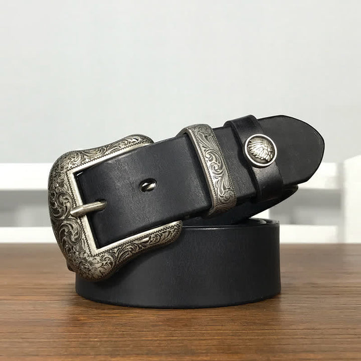 Cintura in pelle con elemento floreale indiano inciso