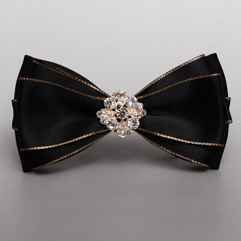 Papillon da uomo con bordo dorato e fiore di strass