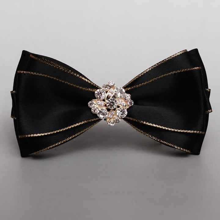 Papillon da uomo con bordo dorato e fiore di strass